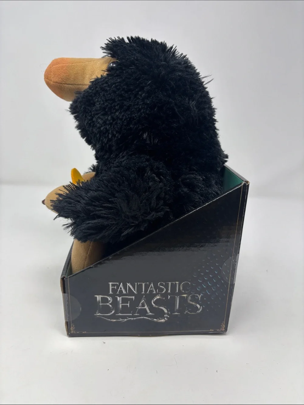Warner Bros. Fantastic Beasts Niffler Plush - Black and Tan with Gold Coin